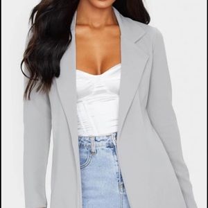 Grey cardigan/jacket/blazer